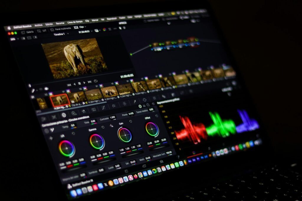 pexels-photo-32774292-32774292 Close-up view of professional video editing software displaying colorful waveforms.